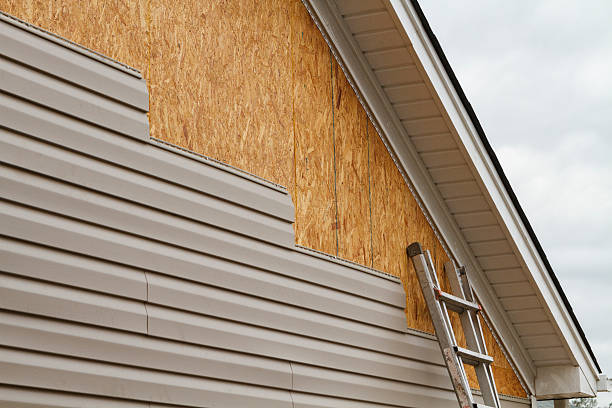 Professional Fiber Cement Siding technician working in Lawrence, NY